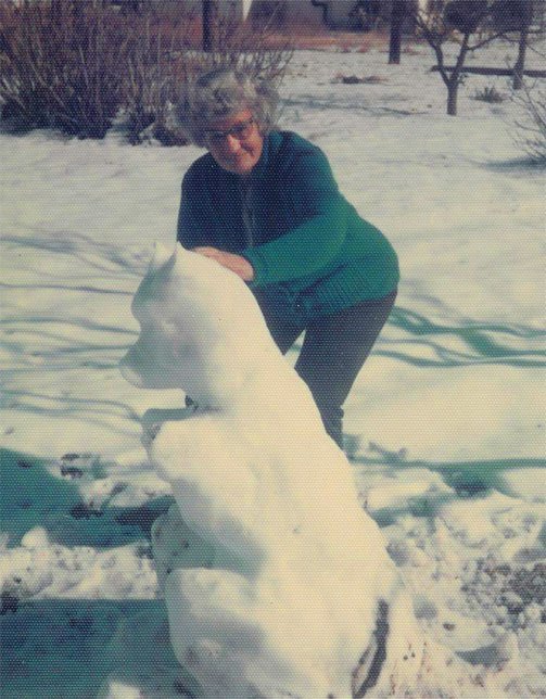 Mom building snow bear