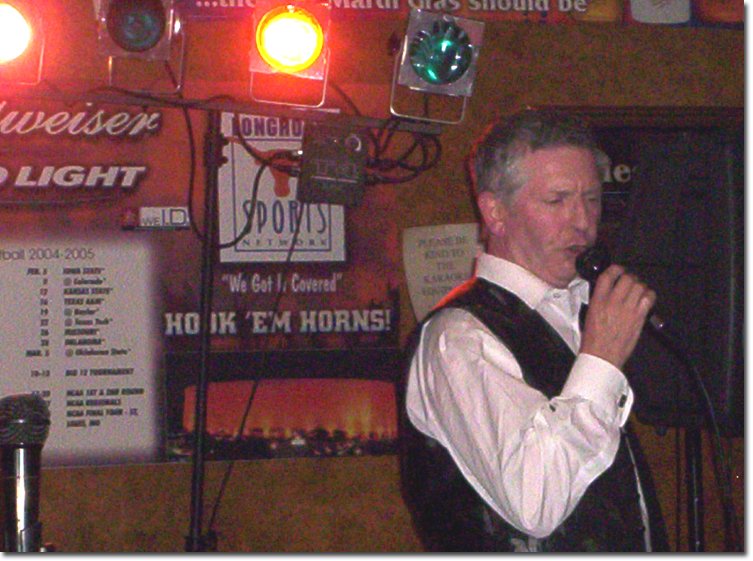 picture ofMichael singing at Kareoke during Sheila and Michael's visit