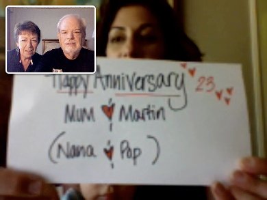 Sharon, Anthony & Julius with Happy anniversary sign