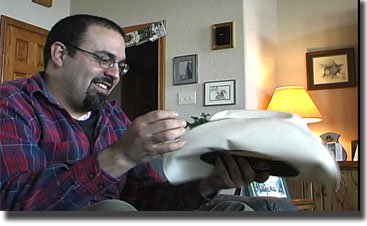  Ken opening Anthony's present at Colorado Drive's first Christmas