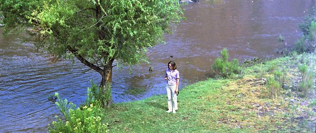Carol beside water running between Ft Davis and Balmorhea around 1967